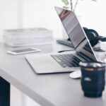 Free Gray Laptop on Table Top Stock Photo